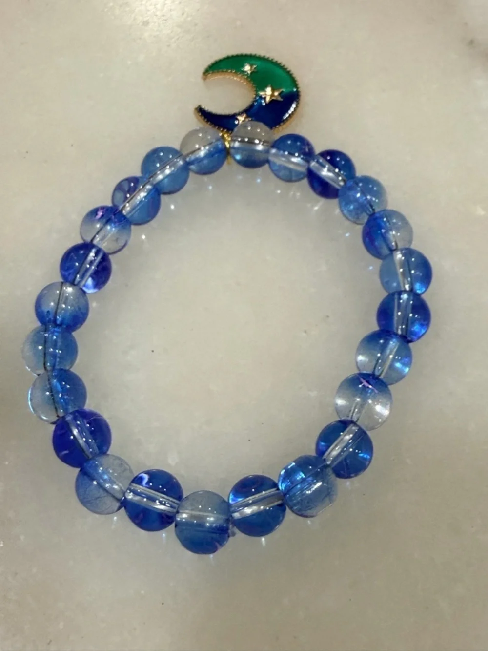 Blue Beaded Bracelet with Blue-Green Crescent Moon Charm